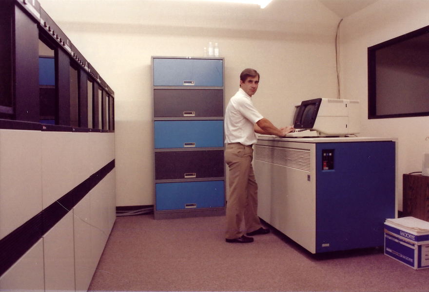 My first computer room. Me at the terminal on the IBM 4361 mainframe.