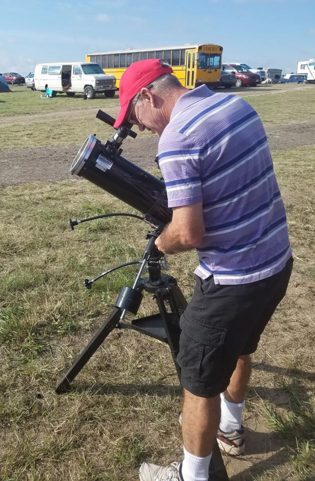 Gene looking through the scope
